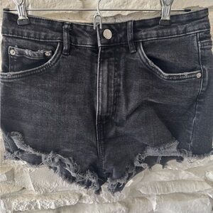 Zara black denim high-rise distressed shorts.